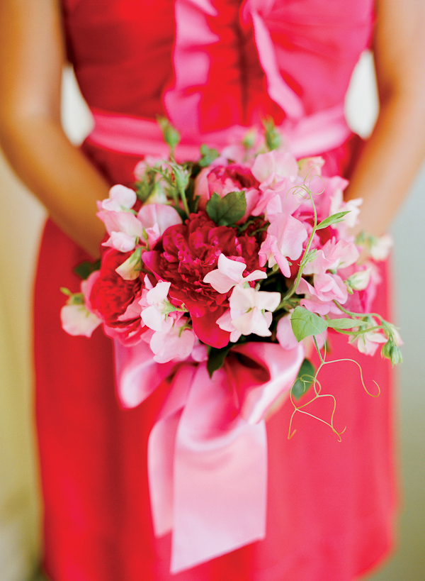 close up photo of bridesmaid's pink and red bouquet - photo by San Francisco based wedding photographer Lisa Lefkowitz
